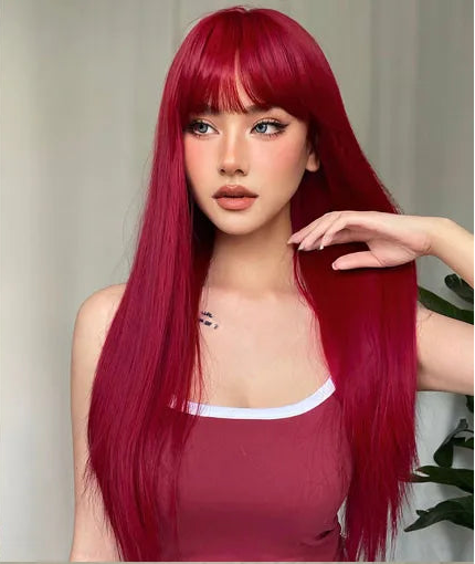 Red wig with bangs displayed on a model