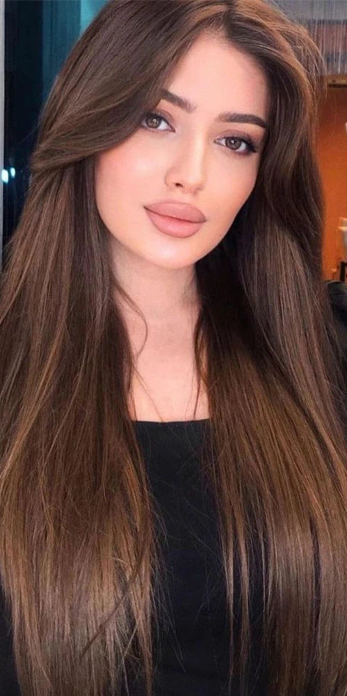 Woman with long brown hair next to hair extensions